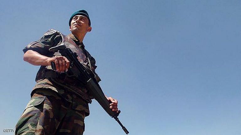 A Turkish soldier with the NATO-led Inte