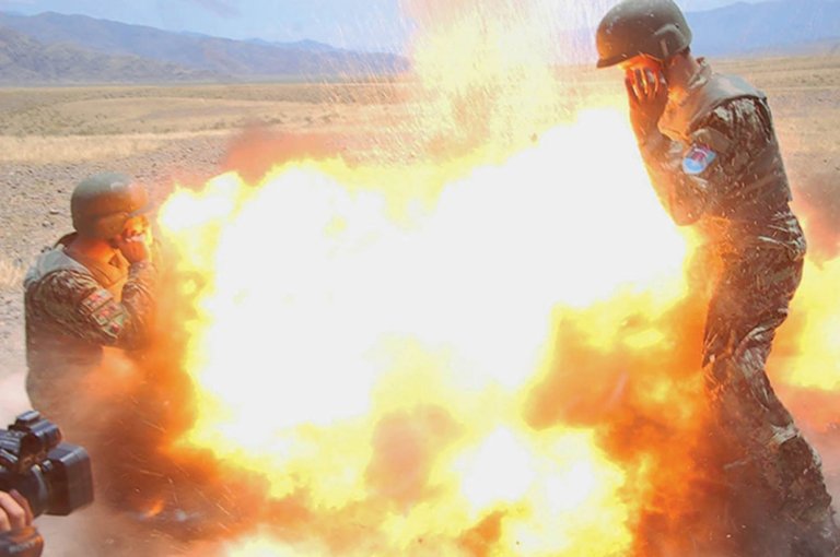 Afghan Army photojournalist  image of mortar exploding