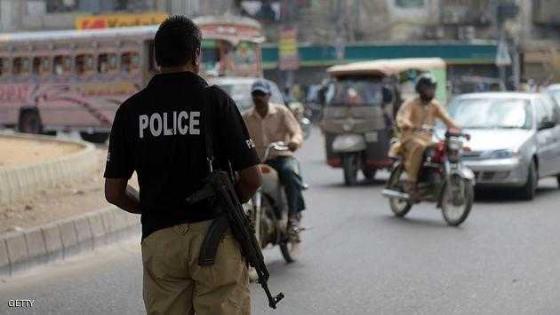 A Pakistani policeman stands guard following an attack on Muttahida Qaumi Movement (MQM) opposition party legislator Rashid Godil in Karachi on August 18, 2015. Unknown assailants riding a motorcycle opened fire on the car of a Pakistani lawmaker on August 18, officials said, critically wounding him in an attack that spiked tensions in the country's largest and most volatile city of Karachi. Rashid Godil, a legislator from the Muttahida Qaumi Movement (MQM) opposition party, was in his parked car at a traffic light in the Bahadurabad neighbourhood in the eastern part of the city when the attackers began firing with automatic weapons. AFP PHOTO / RIZWAN TABASSUM (Photo credit should read RIZWAN TABASSUM/AFP/Getty Images)