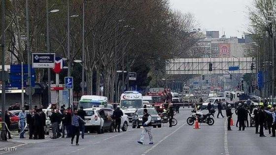 Turkish police officers block a street leading to Istanbul Police headquaters, on April 1, 2015 in Istanbul. A female attacker carrying a bomb and a gun was killed on Wednesday when Turkish security forces opened fire on her and an accomplice after they sought to attack the police headquarters in Istanbul, reports said. AFP PHOTO / OZAN KOSE (Photo credit should read OZAN KOSE/AFP/Getty Images)