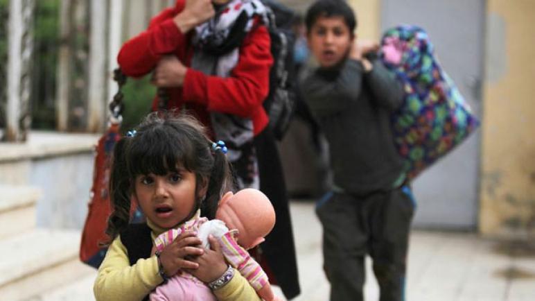 تركيا تقدم مساعدات إلى 1500 عائلة نازحة من الموصل